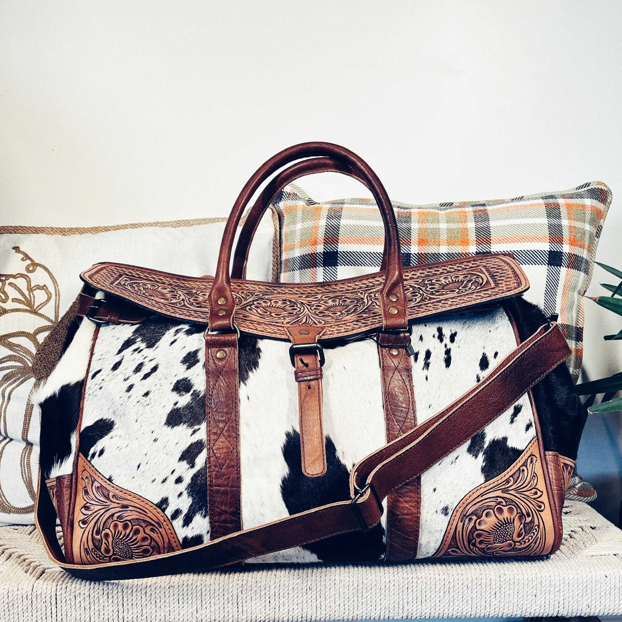 Tooled Leather and Canvas Duffel Bag store