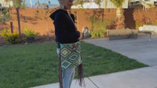 Load and play video in Gallery viewer, Myra Bag, Western Hand Tooled Leather Purse, Genuine Cowhide Purse, Canvas Purse, Boho Chic, Leather Fringe, Aztec Design
