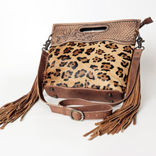 Load image into Gallery viewer, Western Hand Tooled Leather, Cowhide Purse Crossbody bag, Genuine Cowhide, Western Purse, Hair On Hide Purse, Leather Fringe
